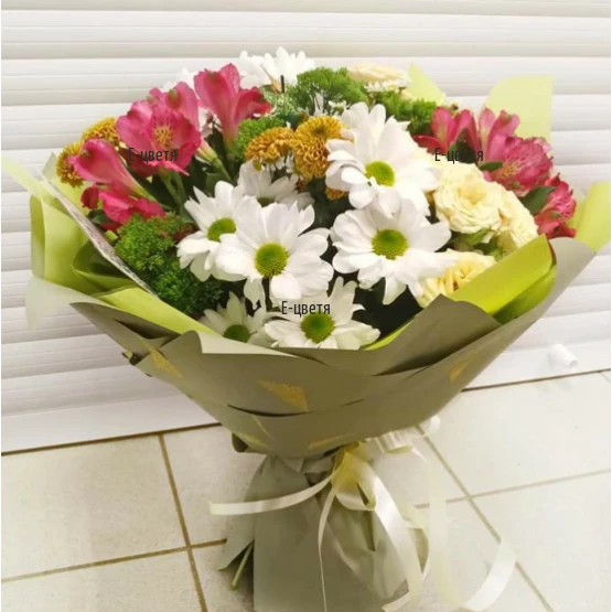 Classical bouquet of fresh flowers and greens