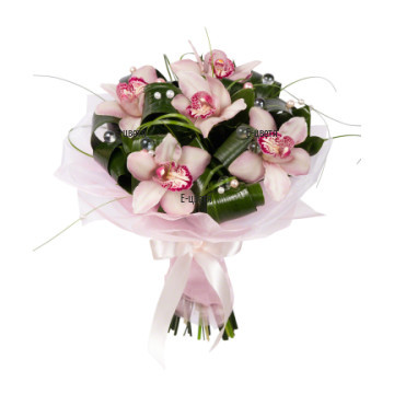 An online order and flower delivery - a bouquet of orchid blooms