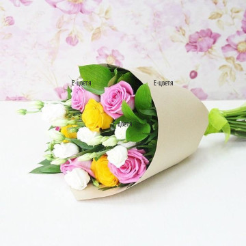 Colourful combination of fresh flowers - eustomas and roses in soft colours. Perfect gift for the First date.