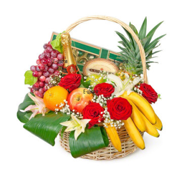 Original and impressive gift. Magnificent basket, arranged with flowers and greenery and gifts for every taste