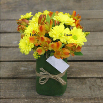 Bright arrangement of flowers in yellow hue - perfect surprise to brighten and cheer up  the day of some one you love and think about.