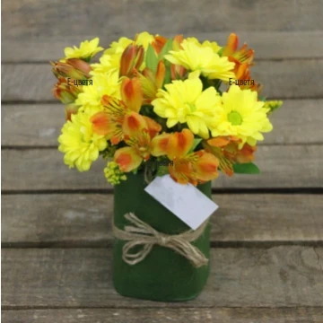 Bright arrangement of flowers in yellow hue - perfect surprise to brighten and cheer up  the day of some one you love and think about.