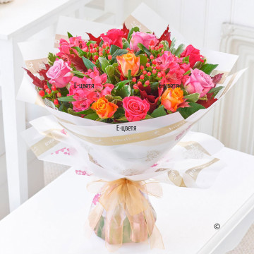 Lovely, tender, unique bouquet of flowers in pink hues, arranged with greenery. One wonderful autumn bouquet!