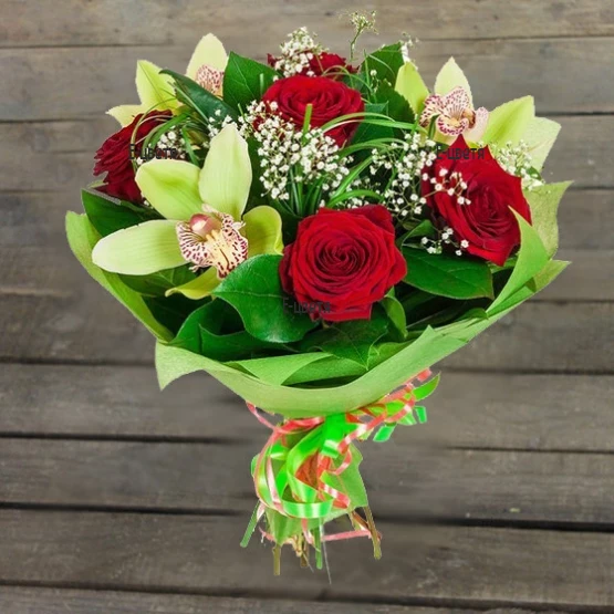 An online order and flower delivery - a bouquet of roses and orchids.