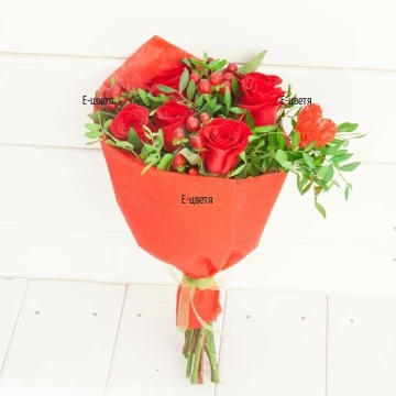 Романтичен букет от червени рози, обилна зеленина и декорация, подходящ за романтична годишнина или изненада.