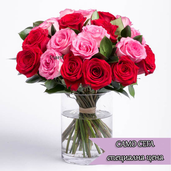 A bouquet of red and pink roses stems