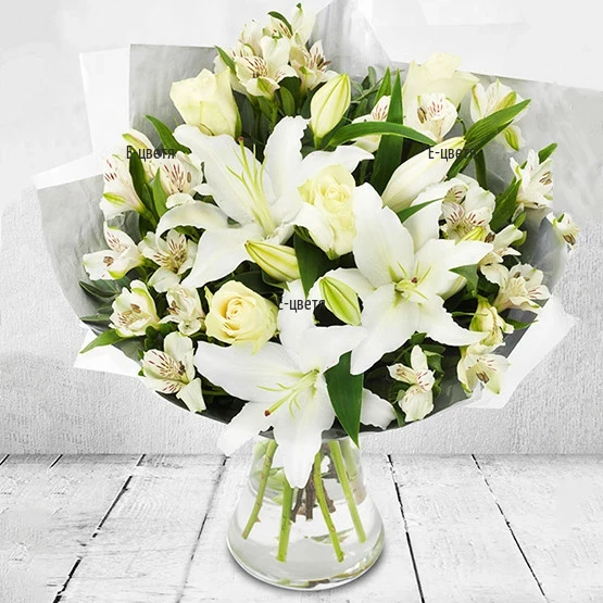 Send festive bouquet of white flowers.