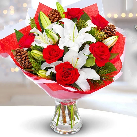 Send a bouquet of roses, lilies and Christmas decoration