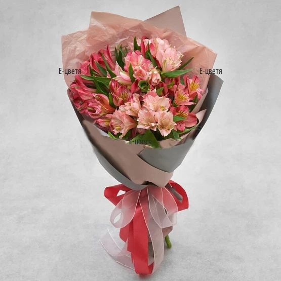 Send a bouquet of pink alstroemerias and greenery.