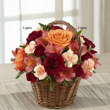 Unique and colourful flower basket, arranged with flowers in pastel colours. Beautiful and exquisite gift for the loved ones.