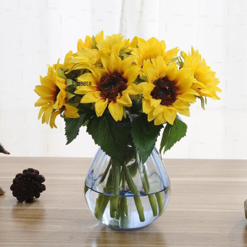 An online order and a delivery of sunflower bouquet by courier.
