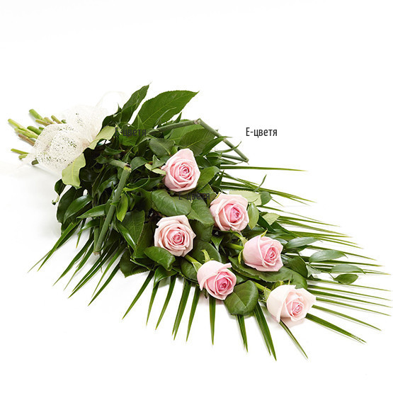 Send a funeral bouquet of pink roses.