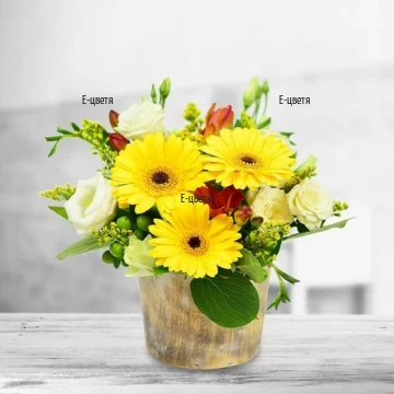 Lovely arrangement of flowers. It will brighten the house or the office of the recipient.
