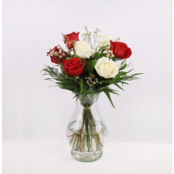 Send a romantic bouquet of roses and greenery
