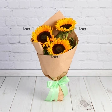 A classic summer bouquet, arranged by bright sunflowers and suitable wrapping. For a complete look - with a beautiful, large ribbon.ЦЬЖЬЦЖЦЬ