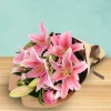 Delicate bouquet of pink lilies and roses