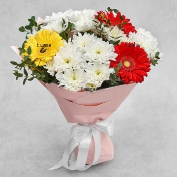 A gift suitable for any personal holiday! A bouquet of white chrysanthemums and multi-colored gerberas, arranged with additional greens.