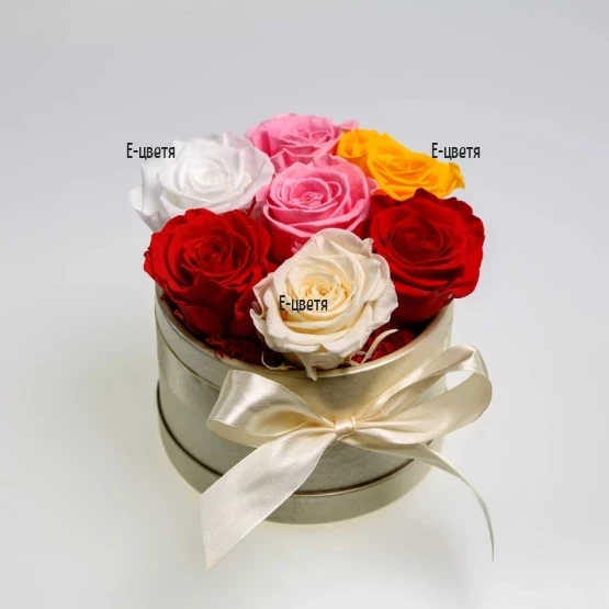 Delivery of multicolored roses in a round box to Bulgaria