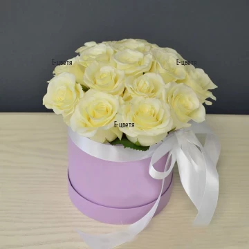 Send white roses in a round box to Bulgaria