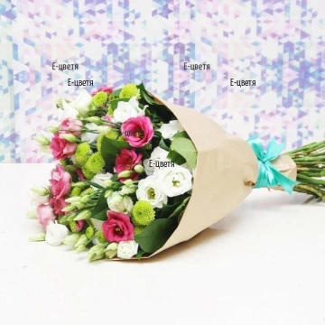 Beautiful, unique bouquet of various, colourful flowers and greenery, wrapped in fancy papers.