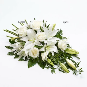 Send funeral bouquet of lilies.