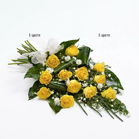 Send a bouquet of yellow roses and greenery