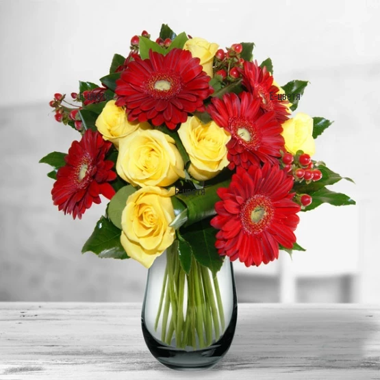 Send a luxurious bouquet of roses and gerberas.