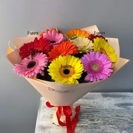 Online order and flower delivery - a bouquet of gerberas in a glass vase