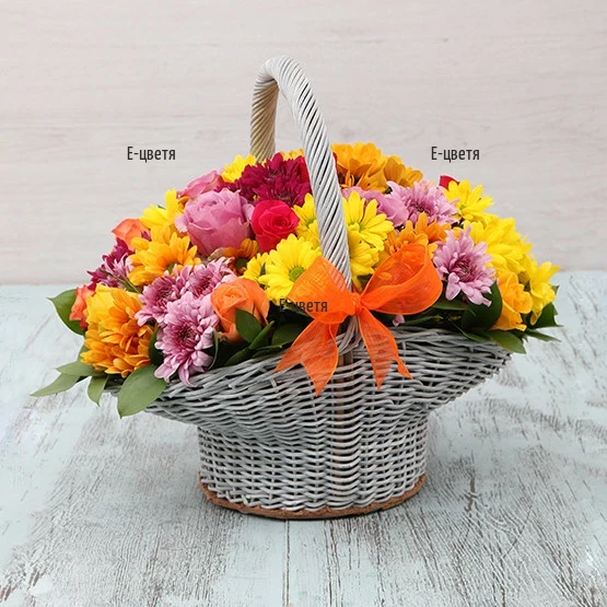 Send a basket with mixed chrysanthemums