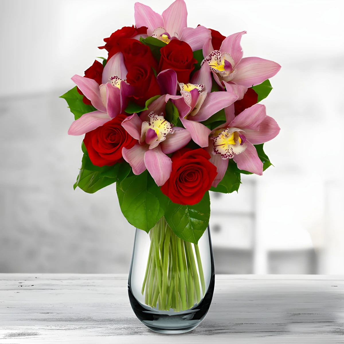 Romantic bouquet of orchids and roses