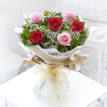 Sens a bouquet of roses and greenery by courier