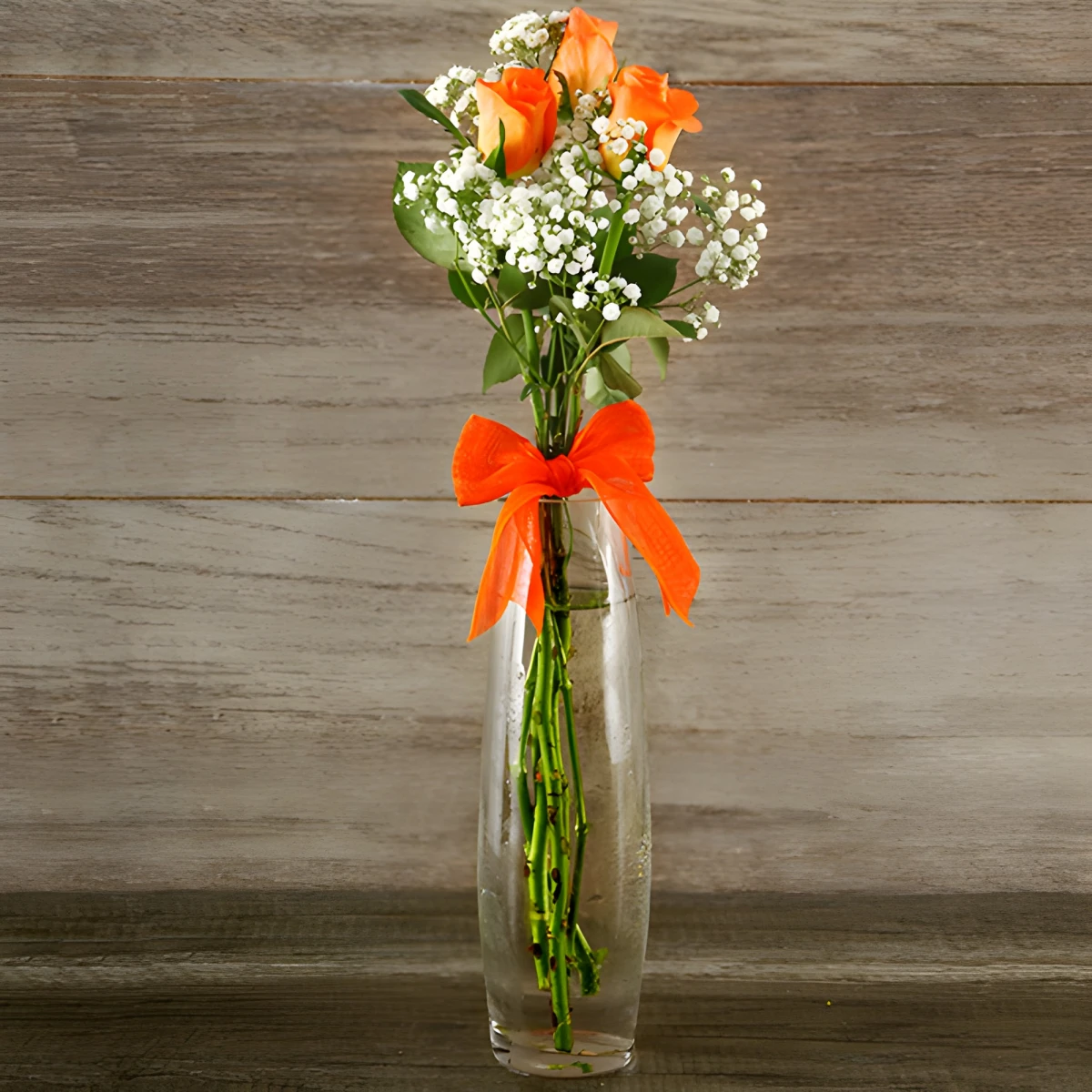 Send a bouquet of three orange roses.