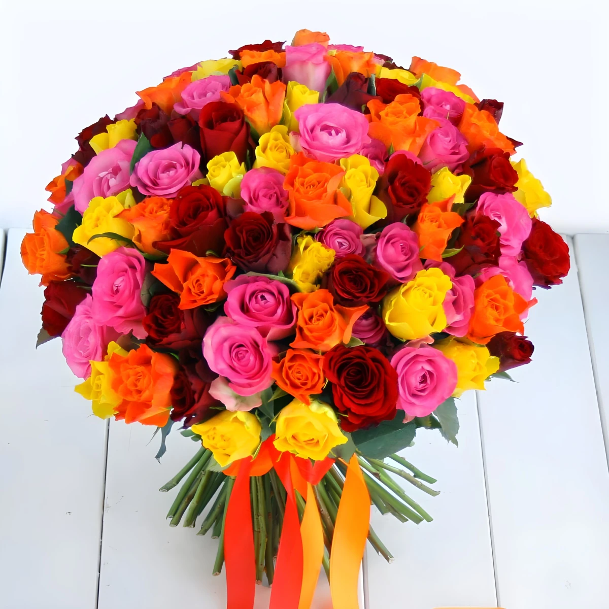 Send enormous bouquet of 101 colourful roses by courier.