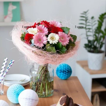 Beautiful, light bouquet of 11 colourful gerberas - white, pink and red, arranged with fresh greenery and special wrapping