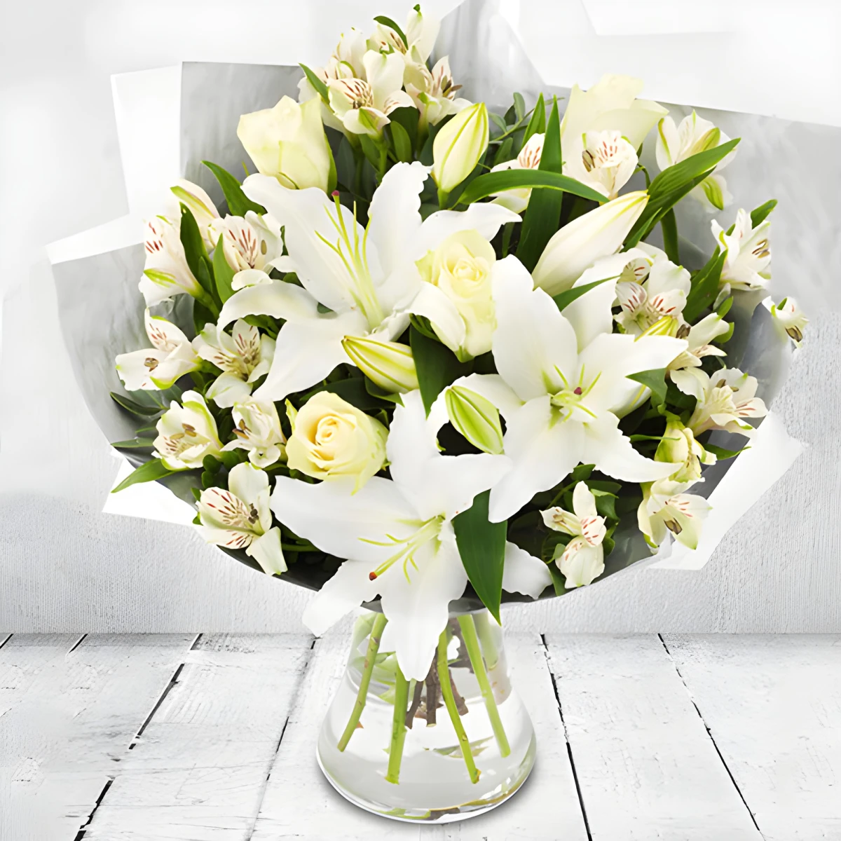 Send festive bouquet of white flowers.