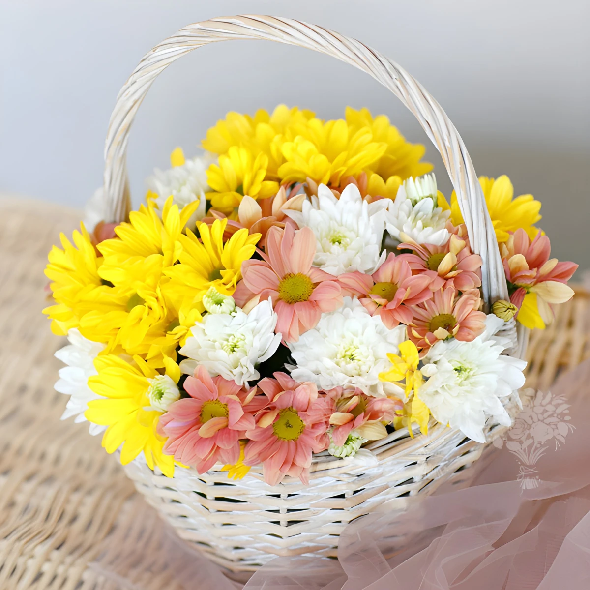 Send a basket with colourful chrysanthemums.