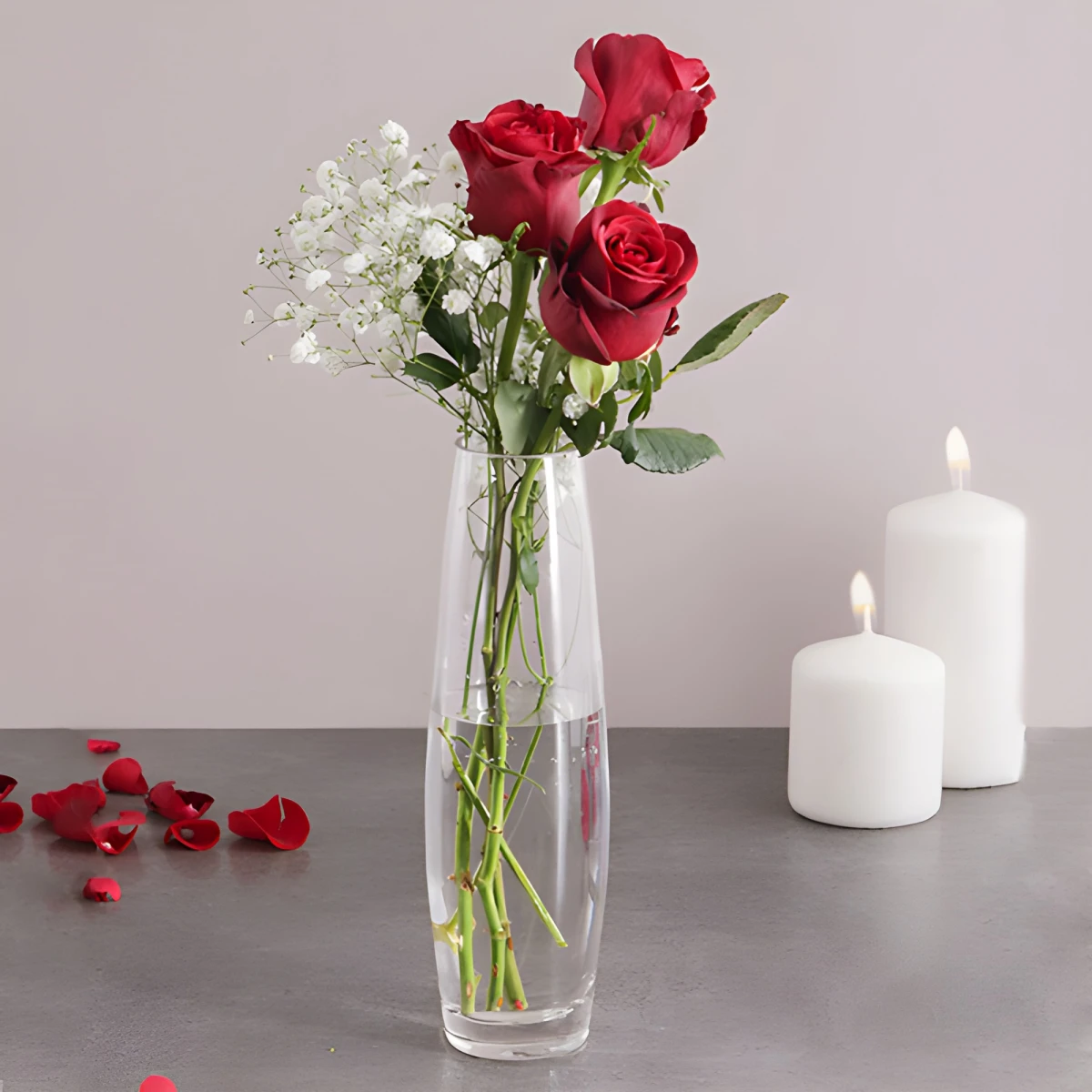 Send a bouquet of three red roses by courier