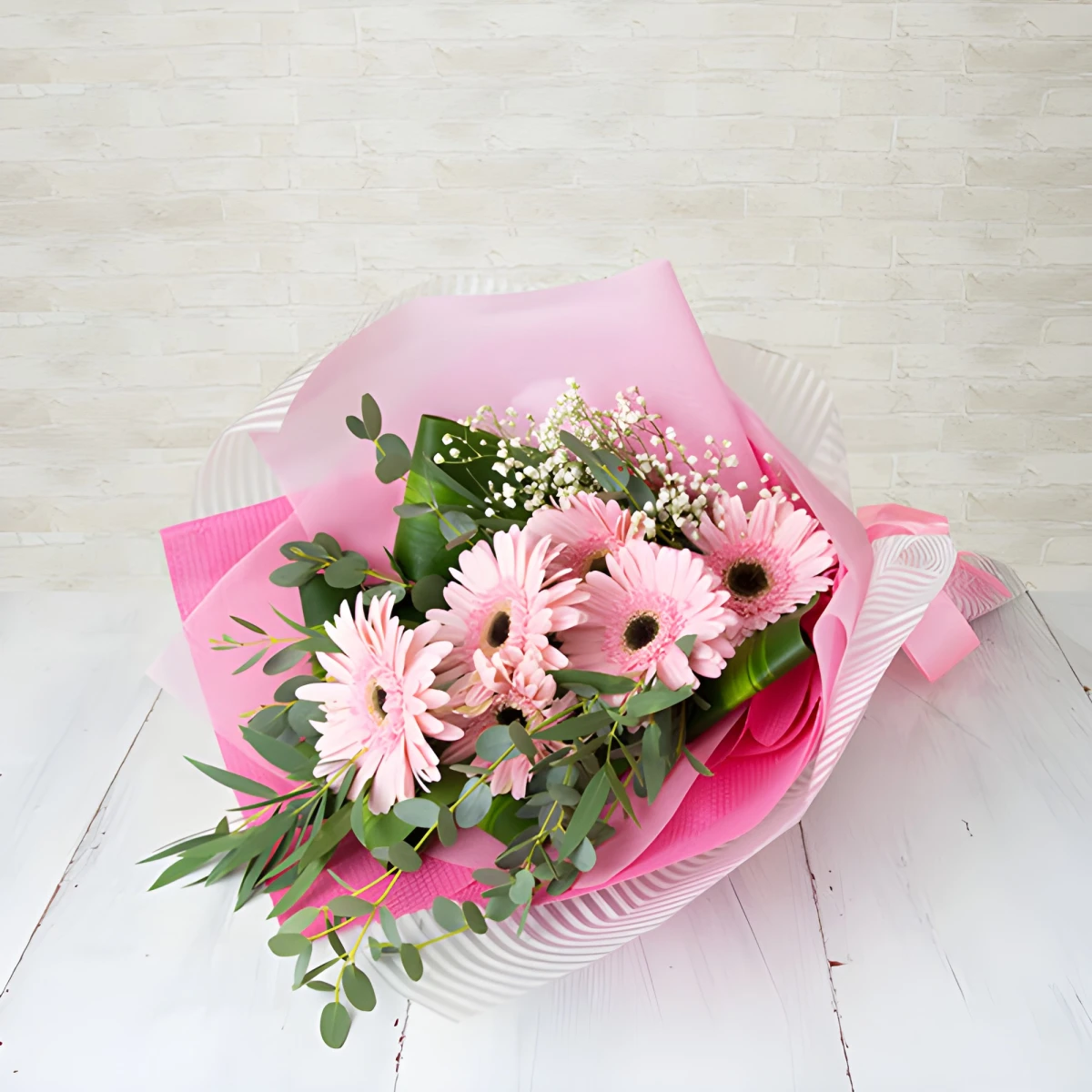 Send a bouquet of gerberas and greenery