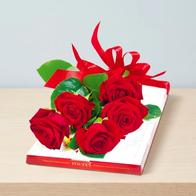 Five 60cm red roses and Merci chocolates – a sweet gift for Valentine's Day or International Women's Day (8 March). Delivered with a card.