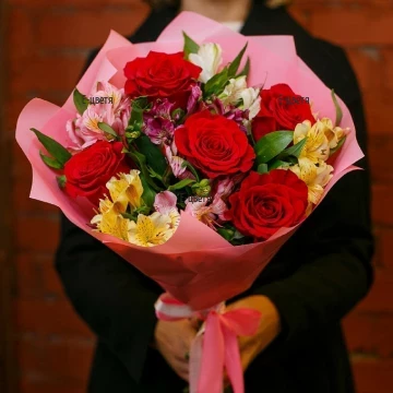 A bouquet of roses and alstroemerias