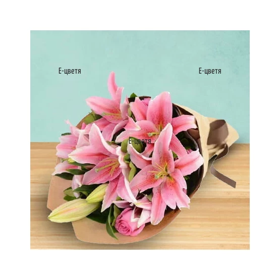 Delicate bouquet of pink lilies and roses