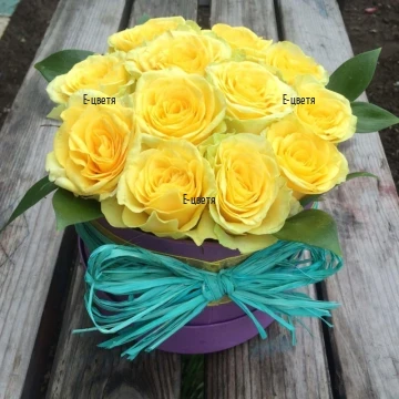 Online order and delivery a box with yellow roses