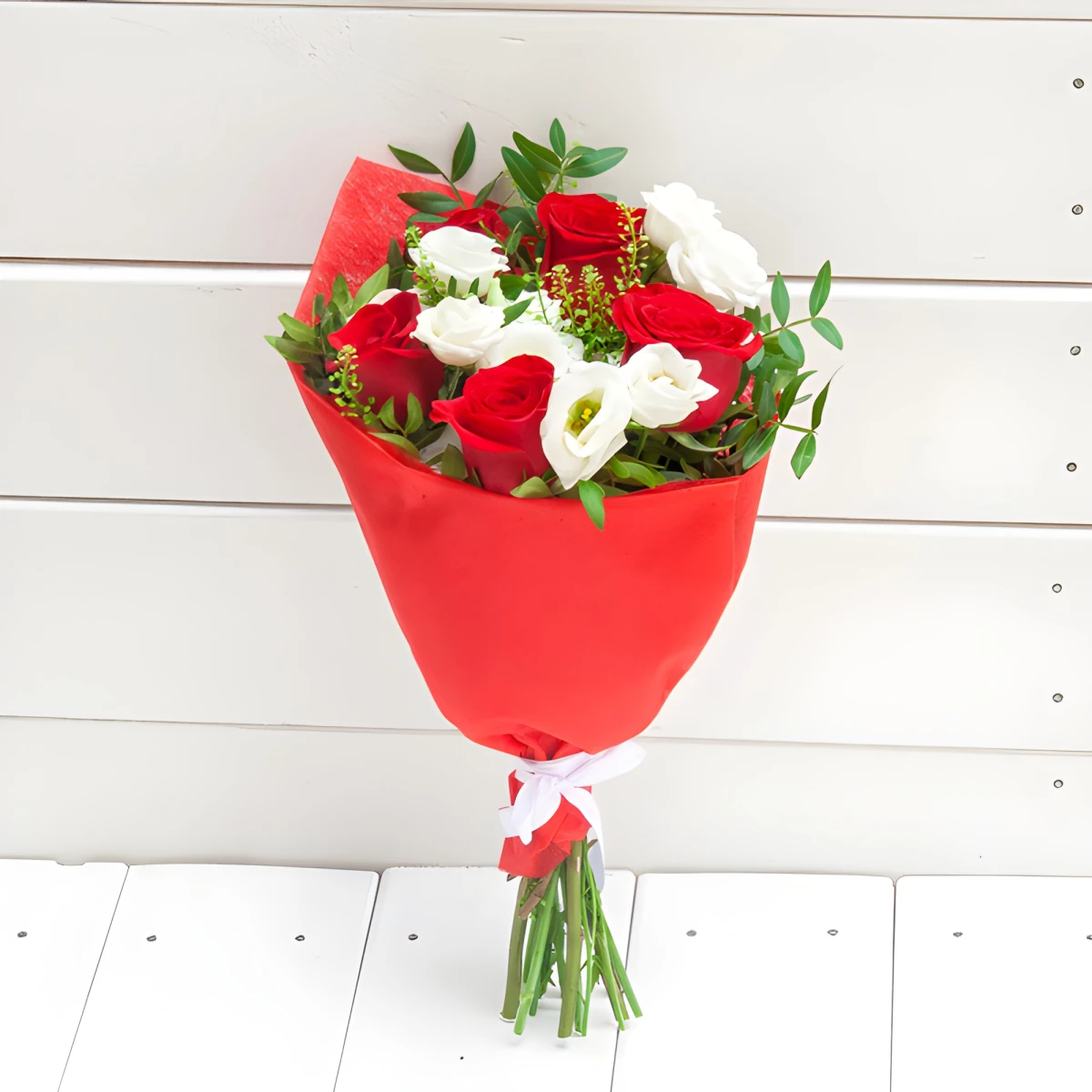 Send a romantic bouquet of roses and eustoma.